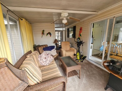 Located in a 55+ resort-style manufactured home community on on Big Cypress Golf and Country Club in Florida - for sale on GolfHomes.com, golf home, golf lot