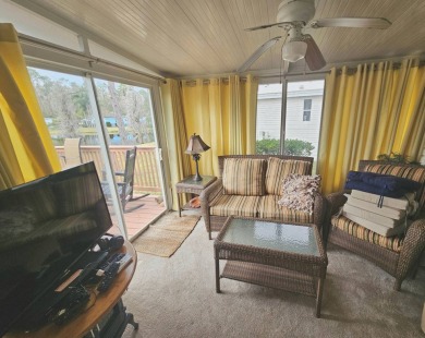 Located in a 55+ resort-style manufactured home community on on Big Cypress Golf and Country Club in Florida - for sale on GolfHomes.com, golf home, golf lot