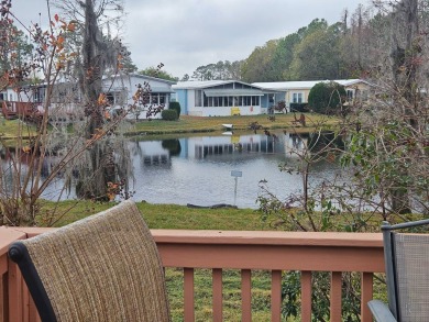 Located in a 55+ resort-style manufactured home community on on Big Cypress Golf and Country Club in Florida - for sale on GolfHomes.com, golf home, golf lot