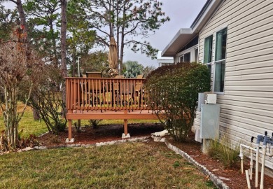 Located in a 55+ resort-style manufactured home community on on Big Cypress Golf and Country Club in Florida - for sale on GolfHomes.com, golf home, golf lot