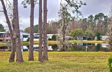 Located in a 55+ resort-style manufactured home community on on Big Cypress Golf and Country Club in Florida - for sale on GolfHomes.com, golf home, golf lot