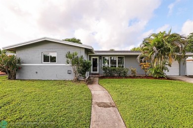 Beautifully Updated 3-Bedroom Home with Modern Upgrades in on Fort Lauderdale Country Club in Florida - for sale on GolfHomes.com, golf home, golf lot