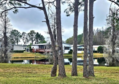 Located in a 55+ resort-style manufactured home community on on Big Cypress Golf and Country Club in Florida - for sale on GolfHomes.com, golf home, golf lot