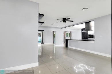 Beautifully Updated 3-Bedroom Home with Modern Upgrades in on Fort Lauderdale Country Club in Florida - for sale on GolfHomes.com, golf home, golf lot