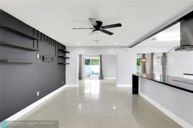 Beautifully Updated 3-Bedroom Home with Modern Upgrades in on Fort Lauderdale Country Club in Florida - for sale on GolfHomes.com, golf home, golf lot