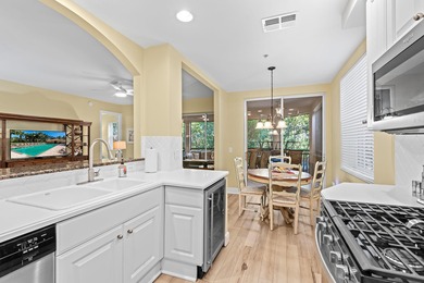 Delightful Deer Crossing 3 bedroom, 2 bath 1st floor end unit on The Rookery At Marco in Florida - for sale on GolfHomes.com, golf home, golf lot