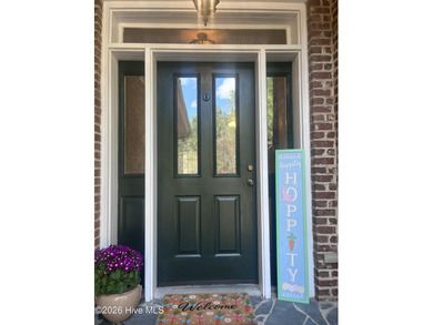 Welcome to your charming all-brick ranch, perfectly situated on on Woodlake Country Club in North Carolina - for sale on GolfHomes.com, golf home, golf lot