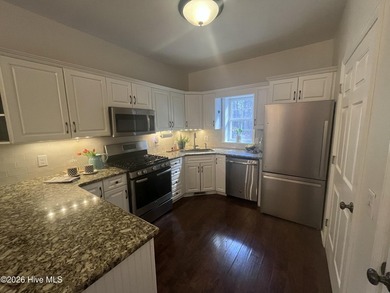 Welcome to your charming all-brick ranch, perfectly situated on on Woodlake Country Club in North Carolina - for sale on GolfHomes.com, golf home, golf lot