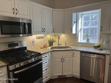 Welcome to your charming all-brick ranch, perfectly situated on on Woodlake Country Club in North Carolina - for sale on GolfHomes.com, golf home, golf lot