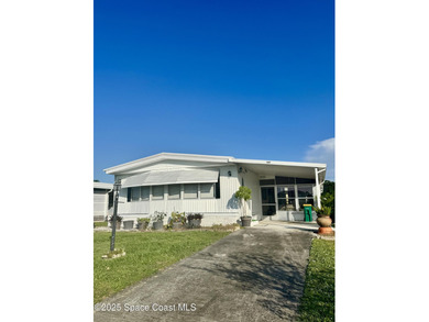 Welcome to the vibrant Barefoot Bay community! This 2-bedroom on Barefoot Bay Golf Course in Florida - for sale on GolfHomes.com, golf home, golf lot