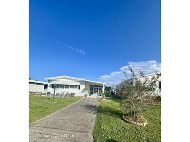 Welcome to the vibrant Barefoot Bay community! This 2-bedroom on Barefoot Bay Golf Course in Florida - for sale on GolfHomes.com, golf home, golf lot