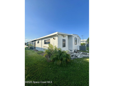 Welcome to the vibrant Barefoot Bay community! This 2-bedroom on Barefoot Bay Golf Course in Florida - for sale on GolfHomes.com, golf home, golf lot