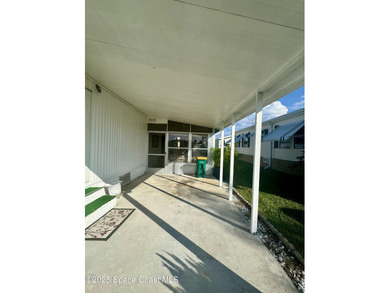 Welcome to the vibrant Barefoot Bay community! This 2-bedroom on Barefoot Bay Golf Course in Florida - for sale on GolfHomes.com, golf home, golf lot