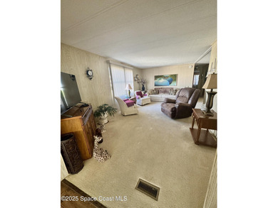 Welcome to the vibrant Barefoot Bay community! This 2-bedroom on Barefoot Bay Golf Course in Florida - for sale on GolfHomes.com, golf home, golf lot