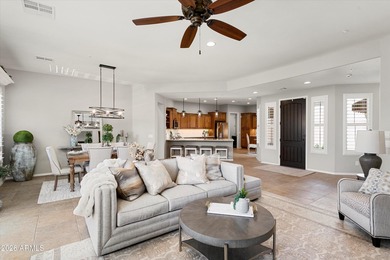 Experience elevated desert living in this HIGHLY UPGRADED on Trilogy Golf Club At Vistancia in Arizona - for sale on GolfHomes.com, golf home, golf lot