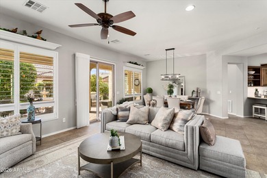 Experience elevated desert living in this HIGHLY UPGRADED on Trilogy Golf Club At Vistancia in Arizona - for sale on GolfHomes.com, golf home, golf lot