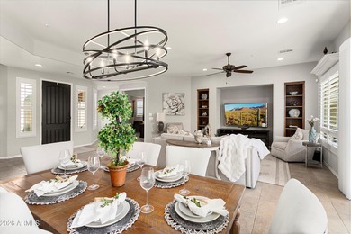 Experience elevated desert living in this HIGHLY UPGRADED on Trilogy Golf Club At Vistancia in Arizona - for sale on GolfHomes.com, golf home, golf lot