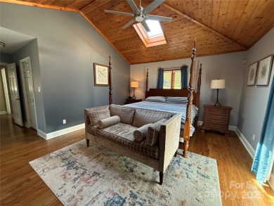 Welcome to this extraordinary all-brick estate, perfectly on Pine Island Country Club in North Carolina - for sale on GolfHomes.com, golf home, golf lot