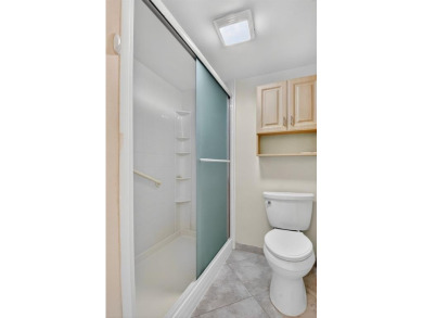 Spacious and move-in ready, this 3-bedroom, 2-bath second-floor on Boca Lago Golf and Country Club in Florida - for sale on GolfHomes.com, golf home, golf lot