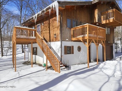 Set on a wooded corner parcel within the gated community of on Lords Valley Country Club, Inc in Pennsylvania - for sale on GolfHomes.com, golf home, golf lot