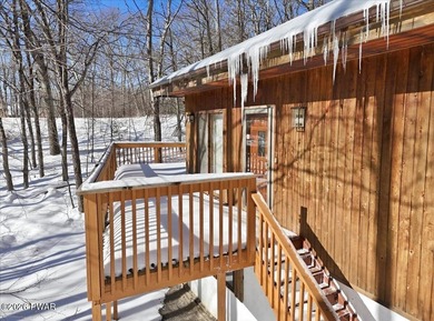 Set on a wooded corner parcel within the gated community of on Lords Valley Country Club, Inc in Pennsylvania - for sale on GolfHomes.com, golf home, golf lot