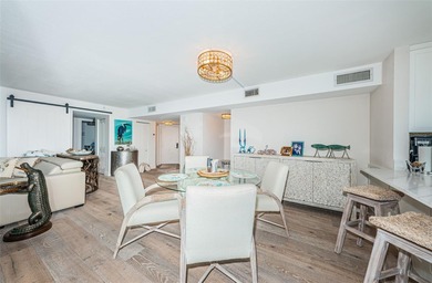 Enjoy spectacular views of Boca Ciega Bay from the moment you on Isla Del Sol Yacht and Country Club in Florida - for sale on GolfHomes.com, golf home, golf lot