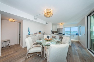 Enjoy spectacular views of Boca Ciega Bay from the moment you on Isla Del Sol Yacht and Country Club in Florida - for sale on GolfHomes.com, golf home, golf lot