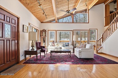 Set on a wooded corner parcel within the gated community of on Lords Valley Country Club, Inc in Pennsylvania - for sale on GolfHomes.com, golf home, golf lot