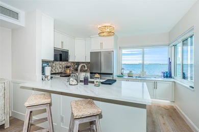 Enjoy spectacular views of Boca Ciega Bay from the moment you on Isla Del Sol Yacht and Country Club in Florida - for sale on GolfHomes.com, golf home, golf lot