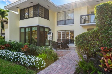 Enjoy picturesque views of the lush golf course and serene on Quail Ridge Golf Course and Country Club in Florida - for sale on GolfHomes.com, golf home, golf lot