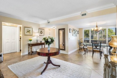 Enjoy picturesque views of the lush golf course and serene on Quail Ridge Golf Course and Country Club in Florida - for sale on GolfHomes.com, golf home, golf lot