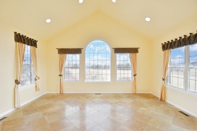 Prepare to be captivated by this remarkable brick Colonial home on Hawthorn Woods Country Club in Illinois - for sale on GolfHomes.com, golf home, golf lot