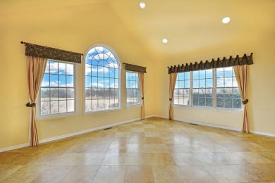 Prepare to be captivated by this remarkable brick Colonial home on Hawthorn Woods Country Club in Illinois - for sale on GolfHomes.com, golf home, golf lot