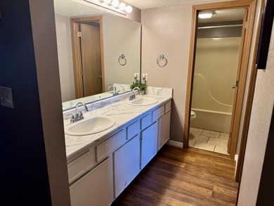 PRICED TO SELL QUICKLY! This charming 2 bedroom 2 bath condo on Pointe Royale Village Country Club in Missouri - for sale on GolfHomes.com, golf home, golf lot