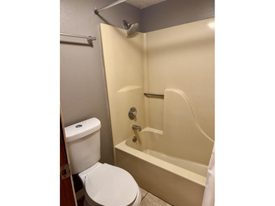 PRICED TO SELL QUICKLY! This charming 2 bedroom 2 bath condo on Pointe Royale Village Country Club in Missouri - for sale on GolfHomes.com, golf home, golf lot