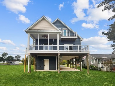 Have you been searching the coast for your dream waterfront home on Captains Cove Golf and Yacht Club in Virginia - for sale on GolfHomes.com, golf home, golf lot