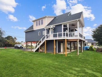 Have you been searching the coast for your dream waterfront home on Captains Cove Golf and Yacht Club in Virginia - for sale on GolfHomes.com, golf home, golf lot