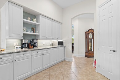 Experience luxury living in this immaculate 4-bedroom, 3-bath on Kelly Plantation Golf Club in Florida - for sale on GolfHomes.com, golf home, golf lot