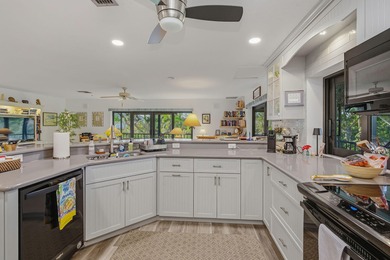 This rare, .54/acre, double-lot home with only one membership on Hideaway Beach Golf Course in Florida - for sale on GolfHomes.com, golf home, golf lot