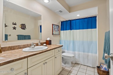 Discover tranquility and entertainment in this fully furnished on Omni Tucson National Golf Resort and Spa - Catalina in Arizona - for sale on GolfHomes.com, golf home, golf lot