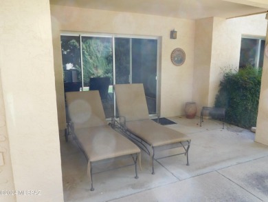 Discover tranquility and entertainment in this fully furnished on Omni Tucson National Golf Resort and Spa - Catalina in Arizona - for sale on GolfHomes.com, golf home, golf lot