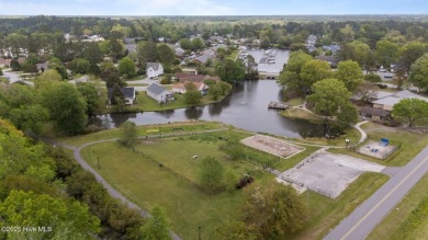 Welcome to 2 Harbour Walk - Your Waterfront Retreat in New Bern
 on River Bend Golf and Country Club in North Carolina - for sale on GolfHomes.com, golf home, golf lot
