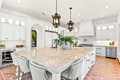 This 5,000 sq ft Spanish-style villa sits on one of the most on Bear Creek Golf and Country Club in California - for sale on GolfHomes.com, golf home, golf lot