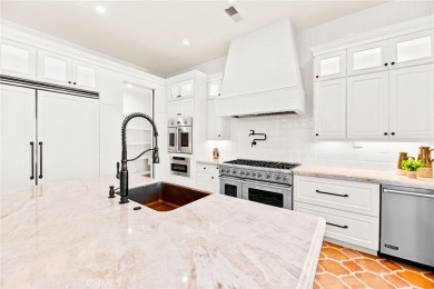 This 5,000 sq ft Spanish-style villa sits on one of the most on Bear Creek Golf and Country Club in California - for sale on GolfHomes.com, golf home, golf lot
