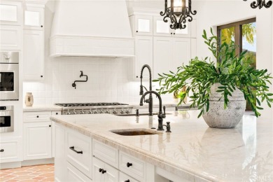 This 5,000 sq ft Spanish-style villa sits on one of the most on Bear Creek Golf and Country Club in California - for sale on GolfHomes.com, golf home, golf lot