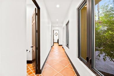 This 5,000 sq ft Spanish-style villa sits on one of the most on Bear Creek Golf and Country Club in California - for sale on GolfHomes.com, golf home, golf lot