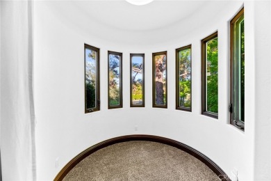 This 5,000 sq ft Spanish-style villa sits on one of the most on Bear Creek Golf and Country Club in California - for sale on GolfHomes.com, golf home, golf lot