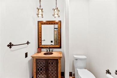 This 5,000 sq ft Spanish-style villa sits on one of the most on Bear Creek Golf and Country Club in California - for sale on GolfHomes.com, golf home, golf lot
