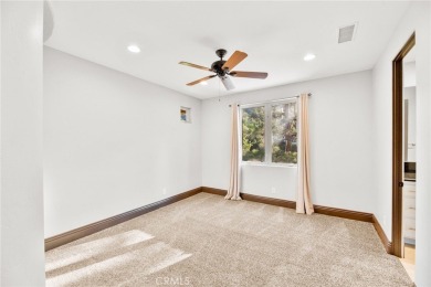 This 5,000 sq ft Spanish-style villa sits on one of the most on Bear Creek Golf and Country Club in California - for sale on GolfHomes.com, golf home, golf lot
