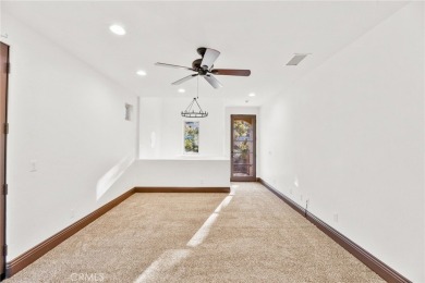 This 5,000 sq ft Spanish-style villa sits on one of the most on Bear Creek Golf and Country Club in California - for sale on GolfHomes.com, golf home, golf lot